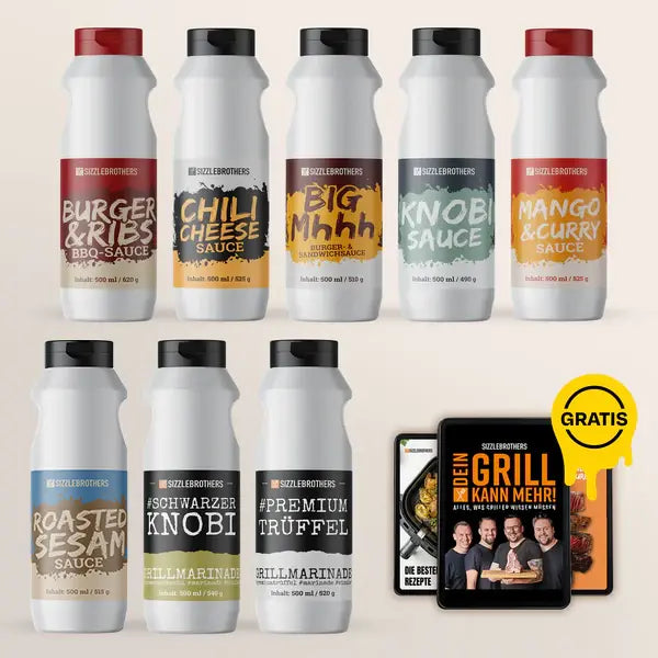 Acht weiße Saucenflaschen, darunter liegt ein Rezeptbuch mit „GRATIS“-Sticker.