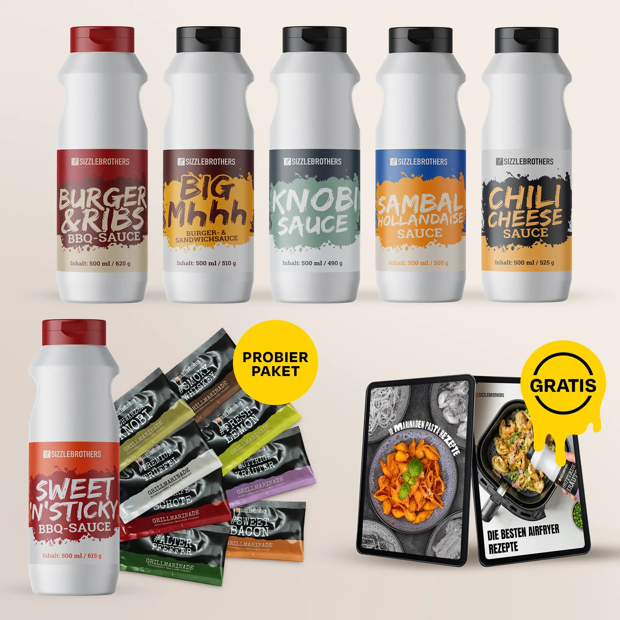 Sieben Saucenflaschen, ein Probierpaket und zwei digitale KochbĂĽcher mit Gratis-Aufschrift.