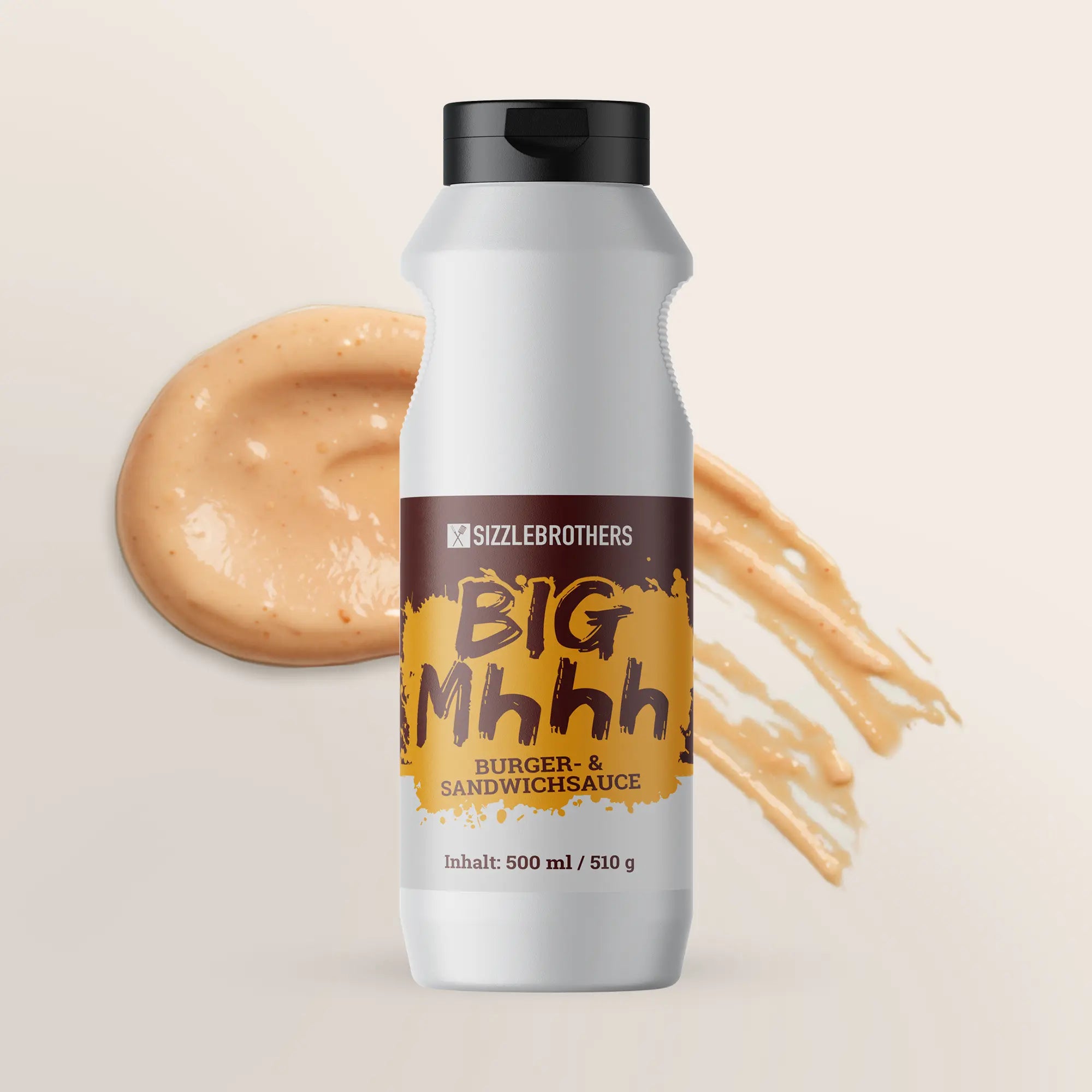 Squeeze-Flasche mit der Aufschrift BIG Mhhh Burger- & Sandwichsauce auf beigem Hintergrund.