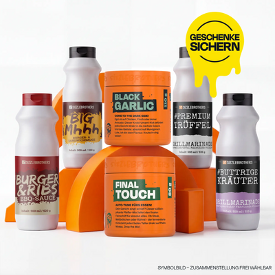 Sechs Flaschen mit orangen und weißen Etiketten. Text: "Geschenke sichern".